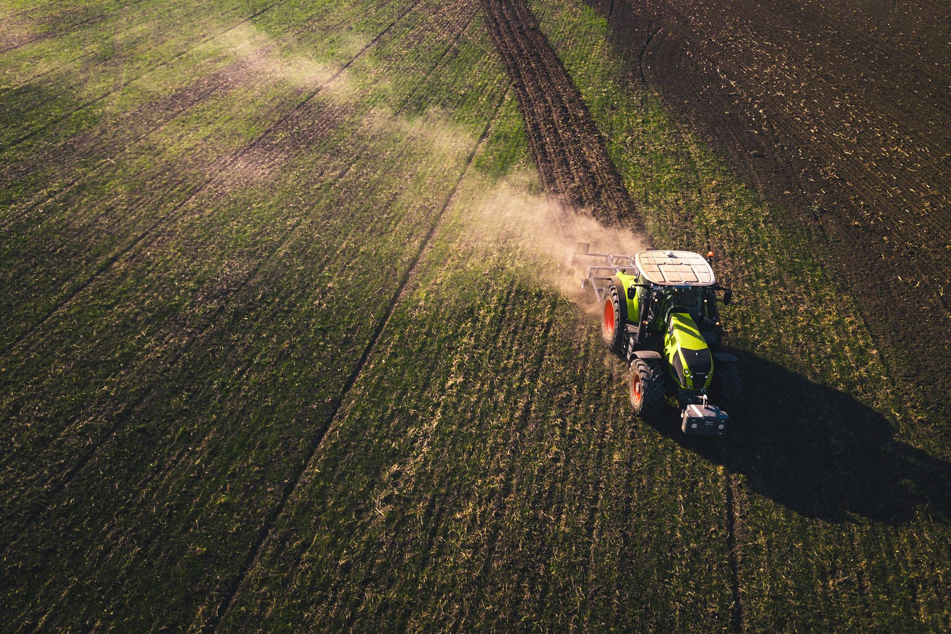 Ikonic agricultural machinery operating on a farm